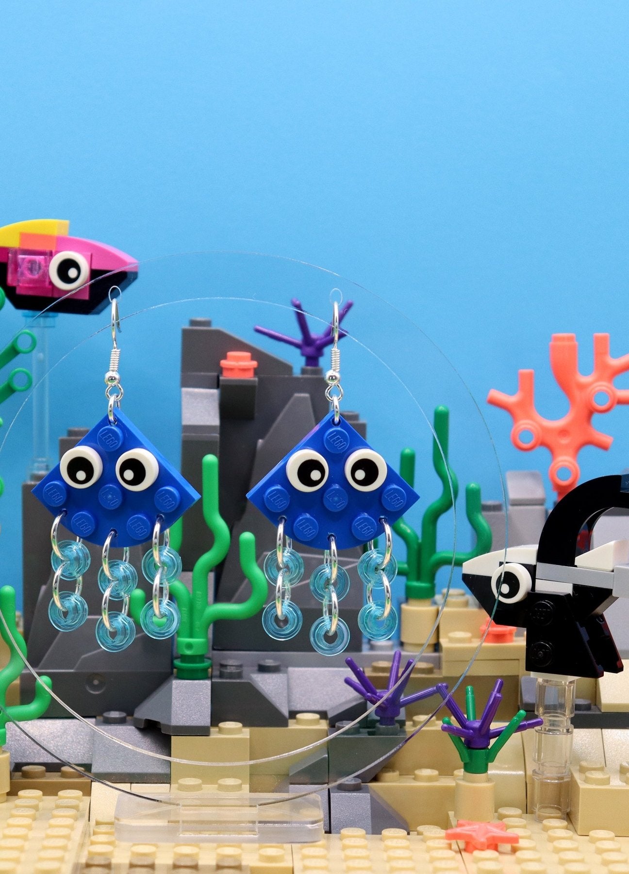 Quirky blue LEGO earrings-Jellyfish with transparent blue tentacles and cartoon eyes - dangles underwater