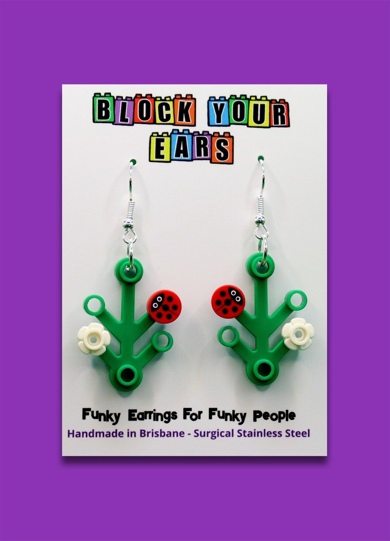 Ladybird, ladybug, lady beetle on LEGO plant-Cute and quirky earrings on display card