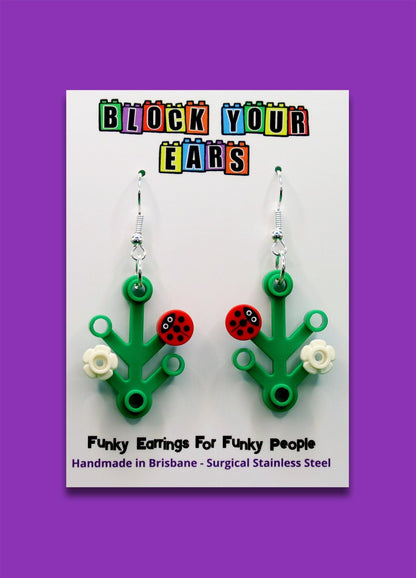 Ladybird, ladybug, lady beetle on LEGO plant-Cute and quirky earrings on display card