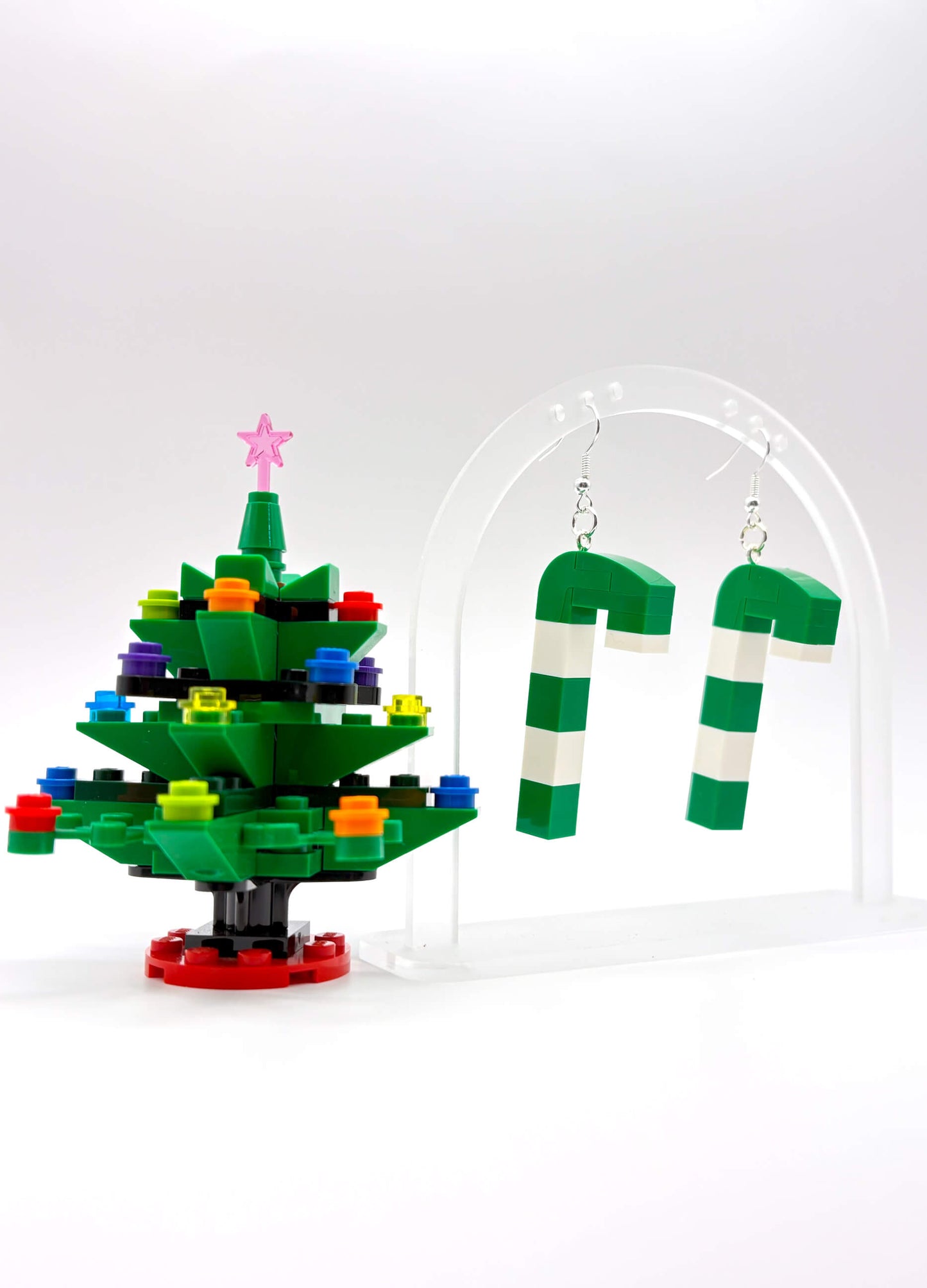 Merry Mintmas LEGO candy cane earrings hanging freely, fun Christmas statement jewellery