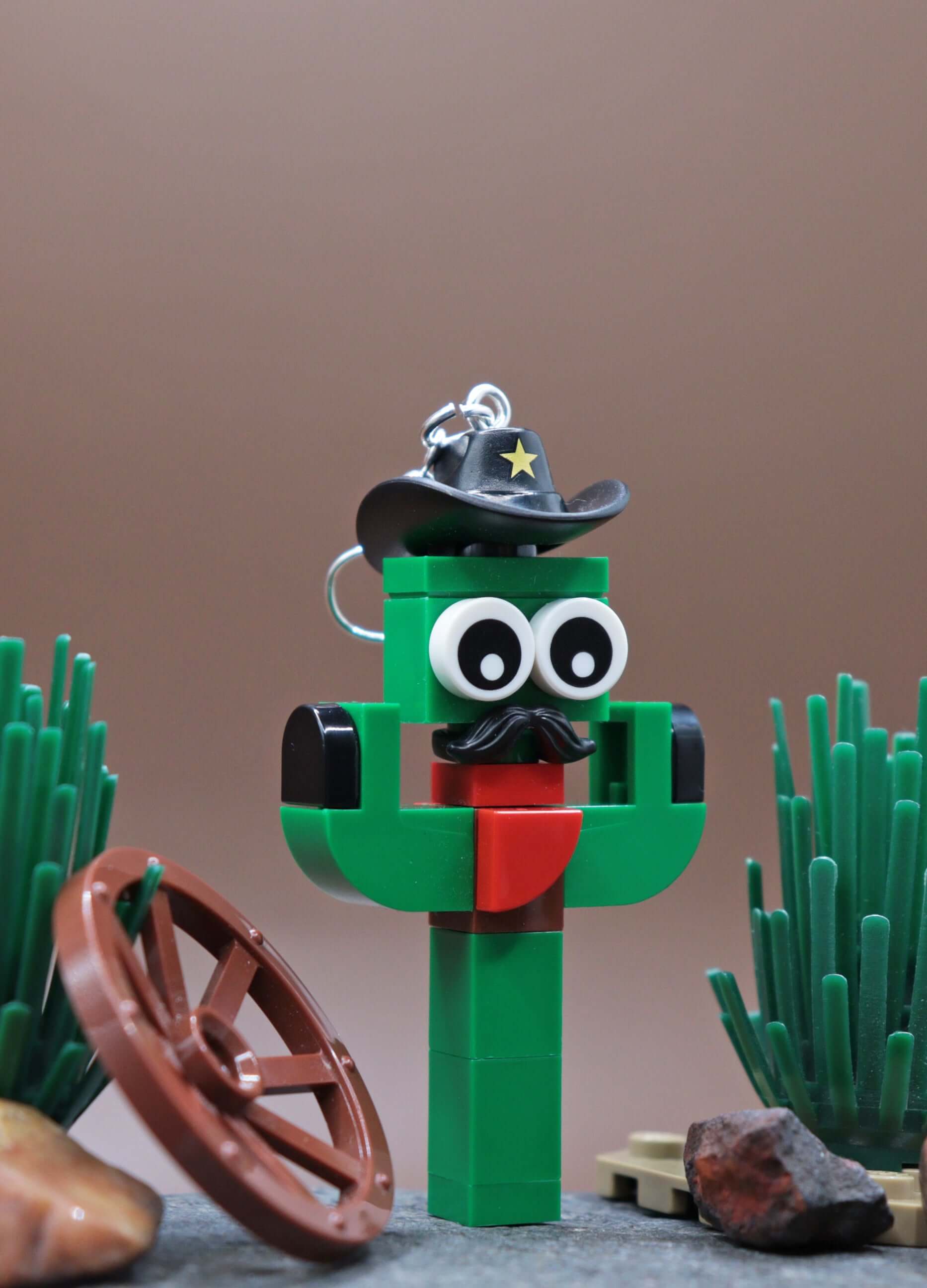 Funky LEGO cactus earring with moustache and sheriff hat - Green-Red