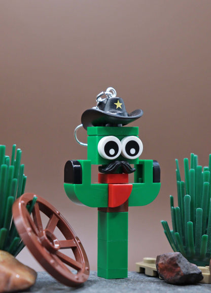 Funky LEGO cactus earring with moustache and sheriff hat - Green-Red