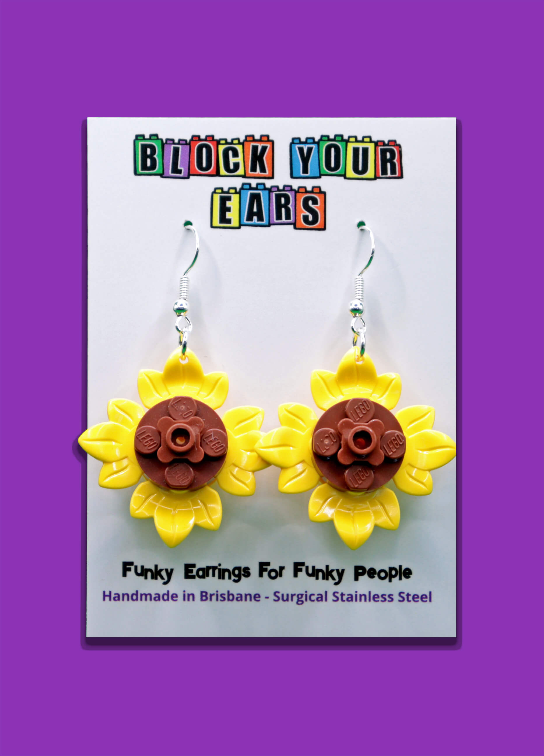 Handmade Sunflower Petals LEGO earrings on display card with purple background