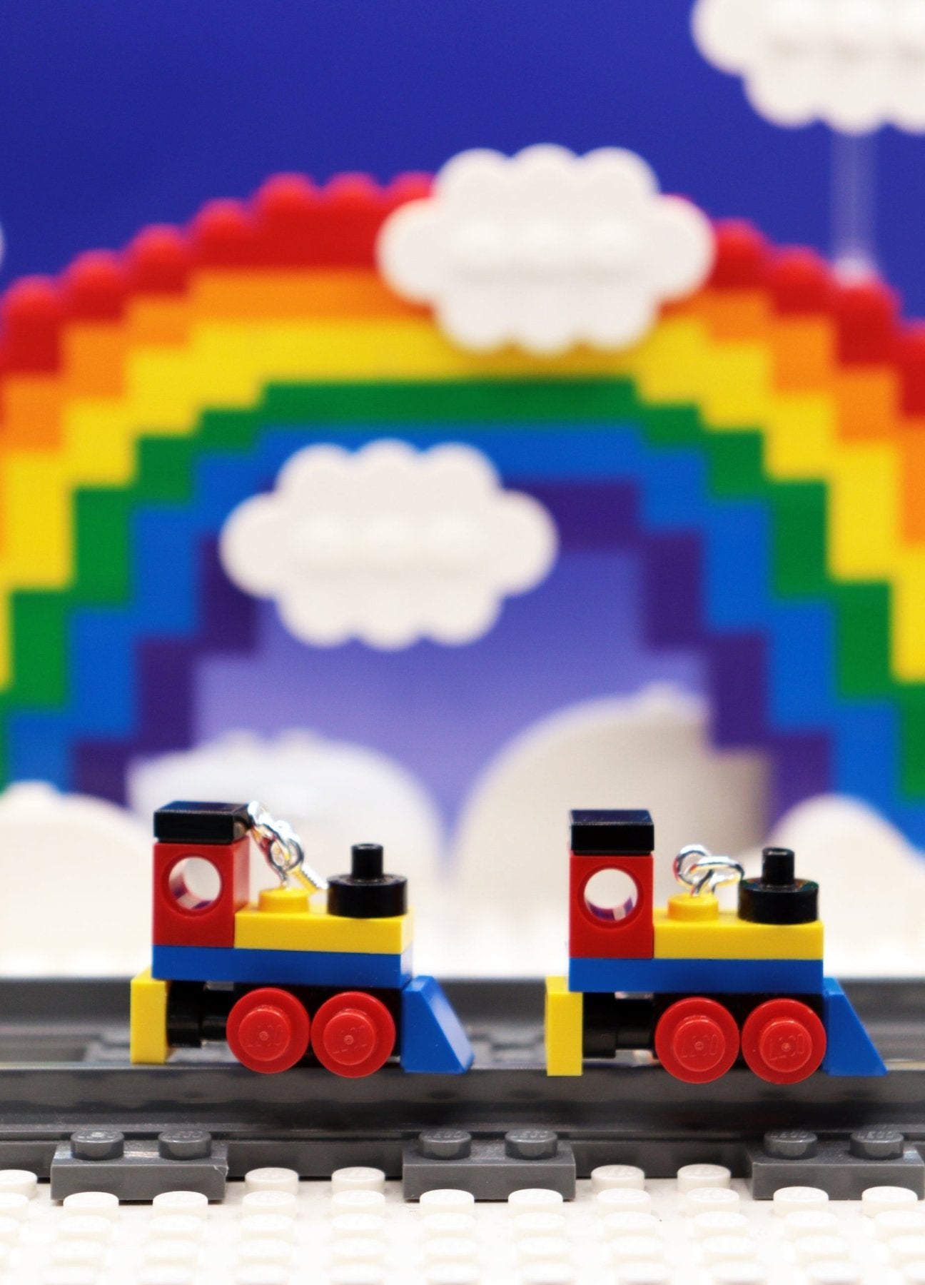 Miniature train earrings made from LEGO-Cute novelty earrings -Yellow/Blue/Red - On tracks with rainbow and clouds