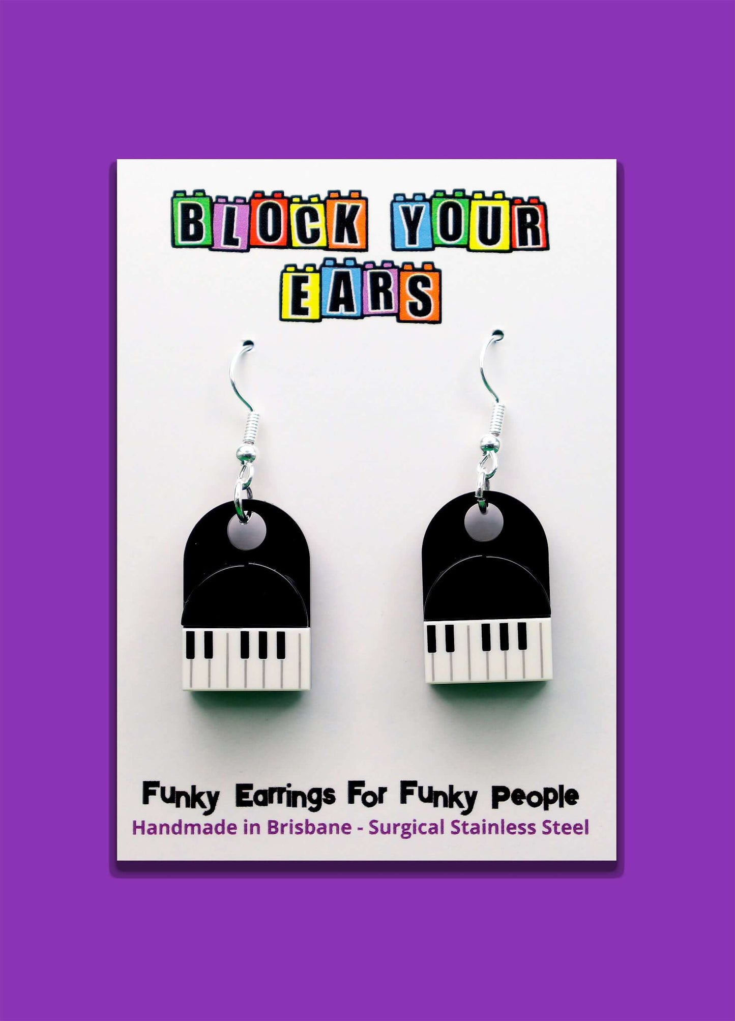 A pair of musical dangle piano earrings handmade with LEGO - Displayed on card
