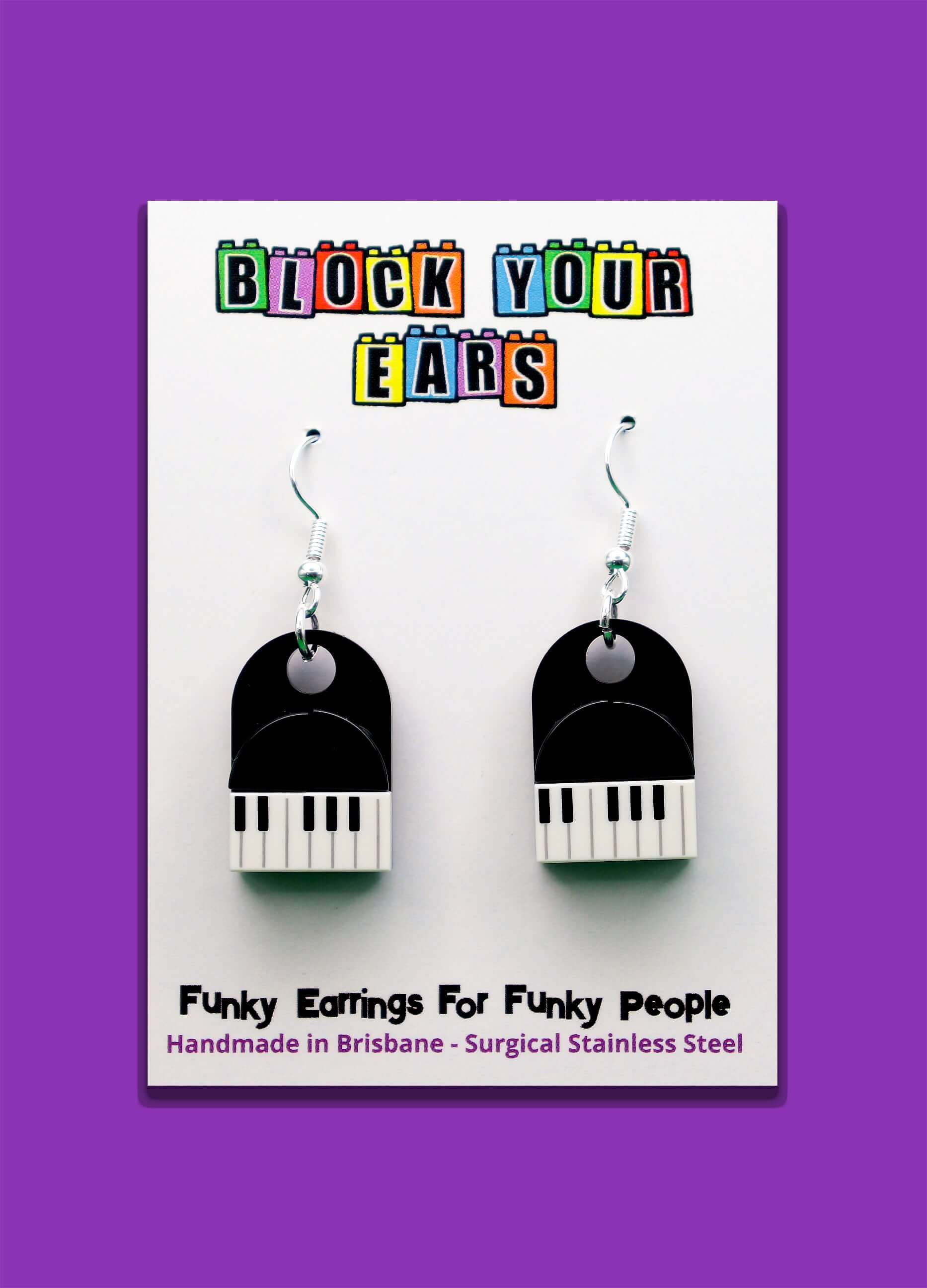 A pair of musical dangle piano earrings handmade with LEGO - Displayed on card