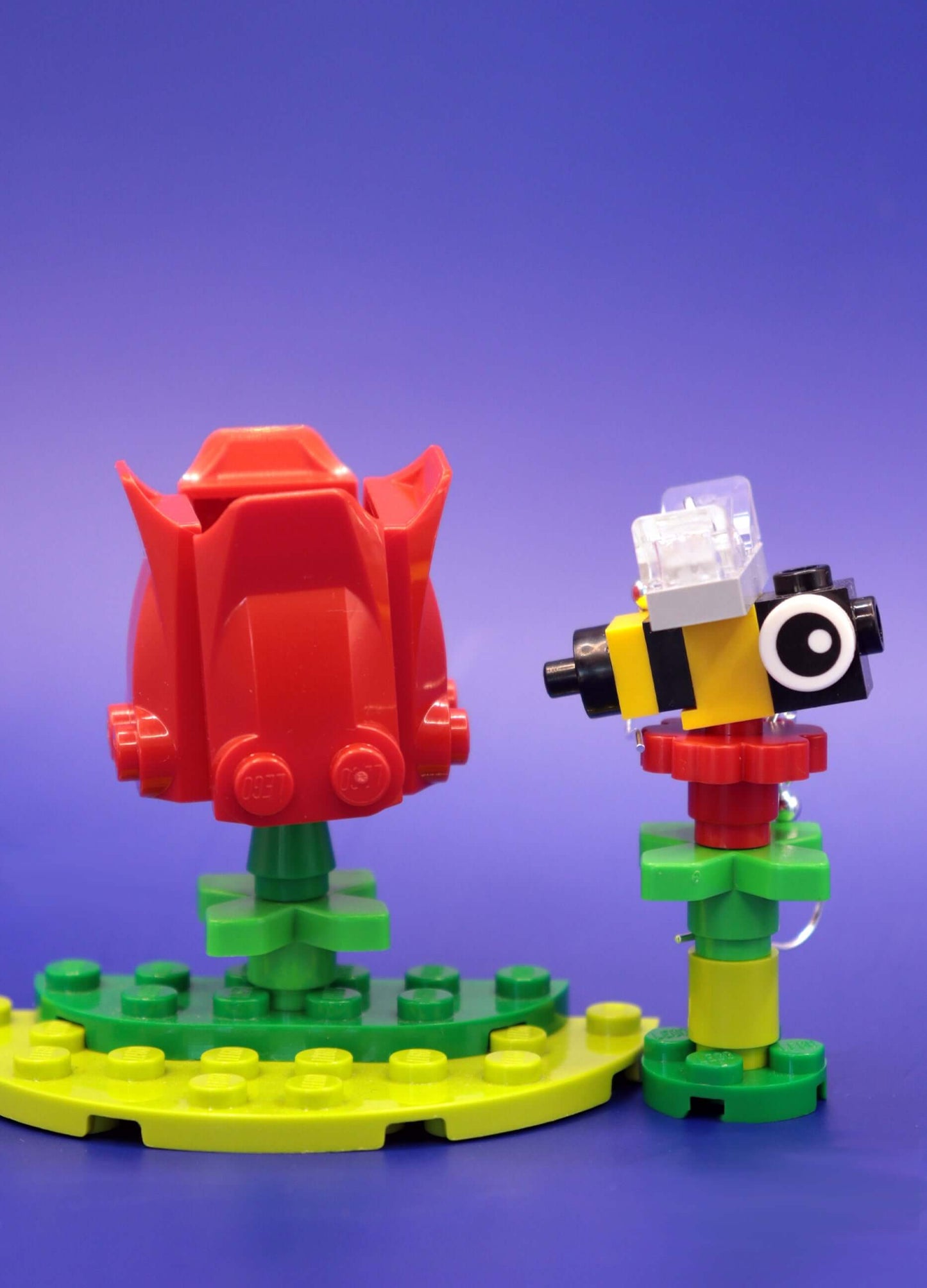 Close up bright and fun mismatched bee and flower dangle earrings - Handmade in Australia using LEGO bricks